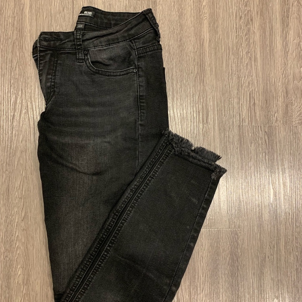 Black washed jeans- cut off with fringe